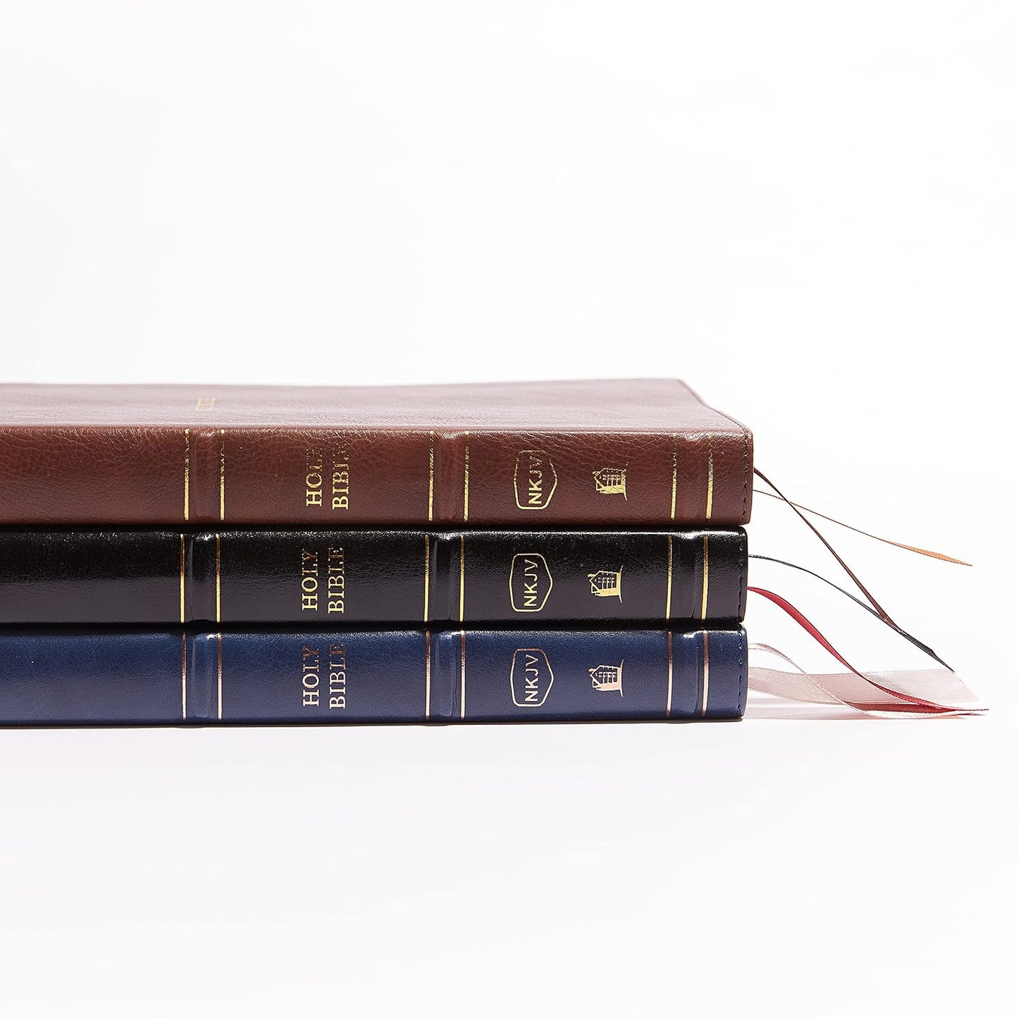 NKJV, Thinline Bible, Leathersoft, Black, Red Letter, Comfort Print: Holy Bible